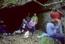 Lunch at the cave in Lustleigh Cleave: Jason drops dead leaves on Luke while Martin, Graha, Gabrielle & John look on.  Mark shows no interest!