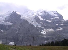 View to Jungfraujoch, the saddle between Jungfrau and Mönch, as we continue the climb to Kleine Scheidagg on the train