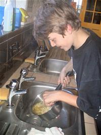 Gage Conway disposes of his noodles at Bellever Youth Hostel