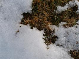 Close-up of the snow lying on the ground by the Avon Dam