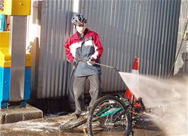 Keir Purdie cleans his bike the quick way at Dart Garage