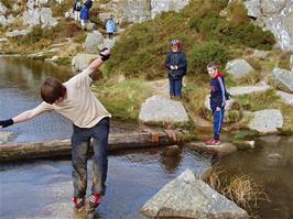 Matt performs precarious gymnastics in the quarry, watched by Zac and Dennis