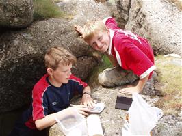 Ashley and Olly find the first letterbox at Saddle Tor