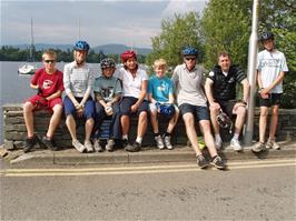 The whole group waiting by the ferry at Bowness Quay, Windermere - matching the location of our 1991 group photo
