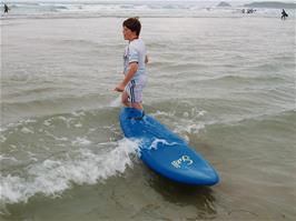 Ashley with his rented surf board at Perranporth