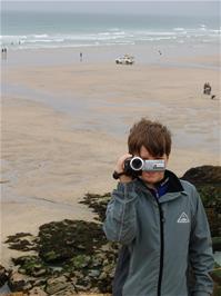 Ash tries to video Michael on Chapel Rock, Perranporth, but the tape has run out