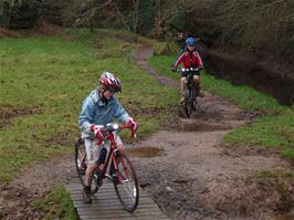 Olly and Sam riding the tracks at the end of Longmarsh, Totnes