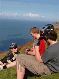 Stopping for a rest on the coast path to Woody Bay