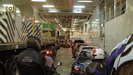 Disembarkation at Ullapool - two enormous crane lorries take up most of the central vehicle space