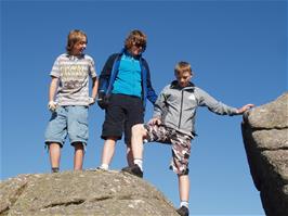 Jack, Ash and Callum climbing rocks at Bonehill