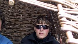 Ash and Lawrence try out the hanging willow basket at the Willow and Wetlands Visitor Centre, Stoke Gregory