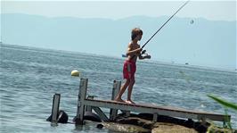 A youngster enjoys his childhood near Ouchy Quay as we eat our lunch