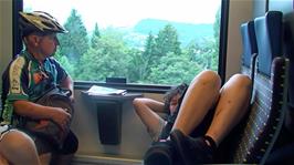 John and Lawrence enjoying the train journey from Brunnen to Lucerne after our 33.4 cycling miles from Hospental