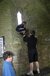 George needs a little help to get down from the window in St Michael's Tower on Glastonbury Tor