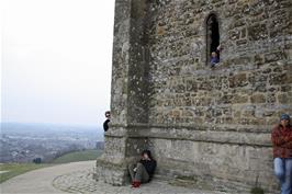 Lawrence tries to escape from St Michael's Tower on Glastonbury Tor while Ash looks on
