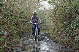 Will Rogers negotiates the muddy upper reaches of the Lower Hembury Track