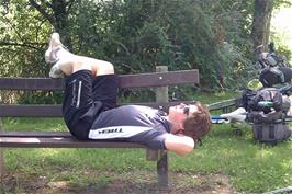 Ash takes a much-needed rest in the shade at our lunch stop by Lake Neuchâtel near Yvonand