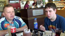 John and Callum enjoying Nile's bakery / café near St Austell, 6.1 miles into the ride