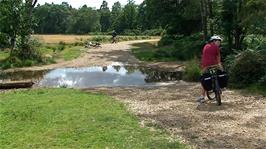 Lawrence prepares to be the first across the Flechs Water ford, 6.1 miles into the ride