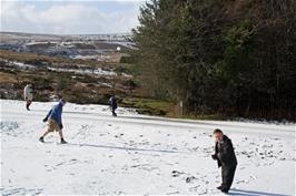 Lawrence aims a snowball at the camera