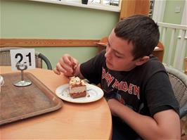 Dillan relishes his chocolate flake cheesecake at Fermoy's Garden Centre