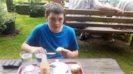 Dillan enjoying afternoon tea at Hill House Garden Centre, Landscove