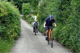 Dillan and John riding towards Week, Dartington from Westcombe