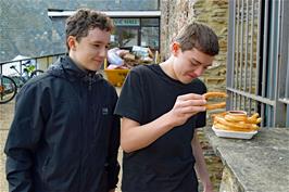 Jude and Dillan try Tulumba - a special kind of doughnut - at Totnes Food Market