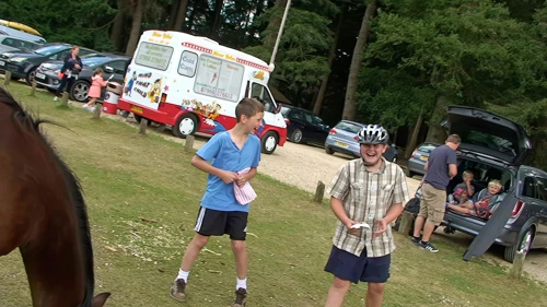 George and Dillan are highly amused that the pony has eaten Michael's lunch!