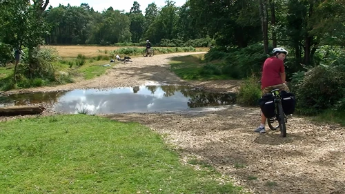 Lawrence prepares to be the first across the Flechs Water ford, 6.1 miles into the ride