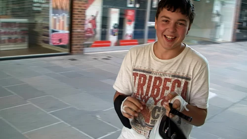 Lawrence, outside Costa in Old George Mall Salisbury, explains how he fell off his bike on the track to Odstock and had to bandage up his grazed hands