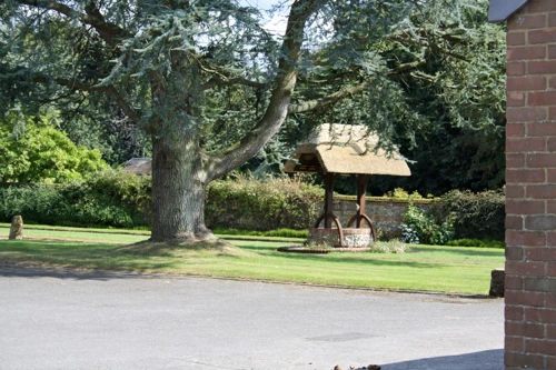 A very nice well in some very smart gardens near Manor Stables, Whitsbury