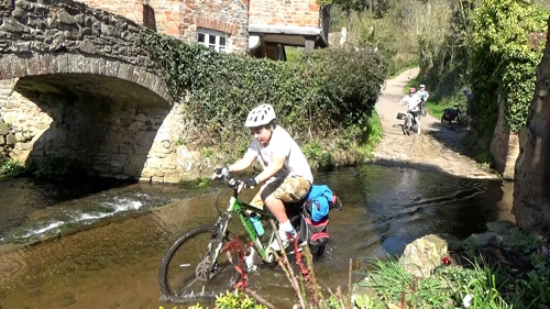 Lawrence successfully negotiates the ford at Allerford.