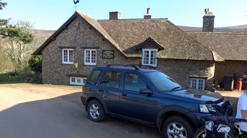 Quick stop at Cloutsham Farm to refill bottles before the Exmoor climb.