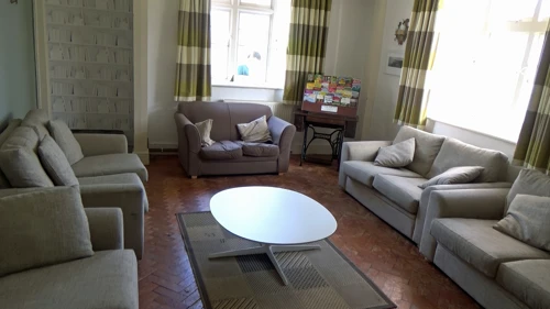 Exford hostel common room, scene of last night's Monopoly and Bomberman