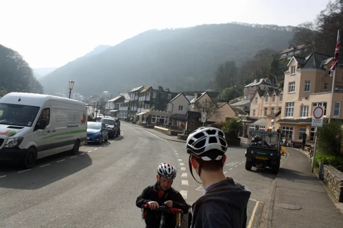 John and Will in Lynmouth, looking back to the Bath Hotel