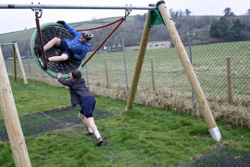 Dillan and George methodically test the play park kit.
