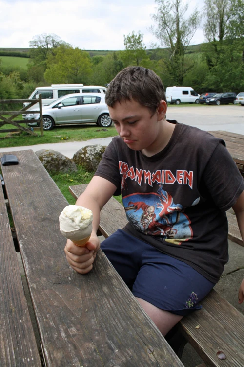 Dillan enjoys toffee ice cream crowned with clotted cream.