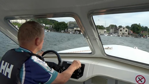 John pilots us back to Bowness Marina with a steady hand