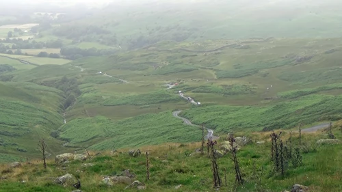 The road drops into Eskdale from Hardknott Pass