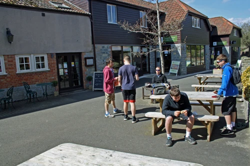 Enjoying cakes outside the café at the Willows & Wetlands Centre.