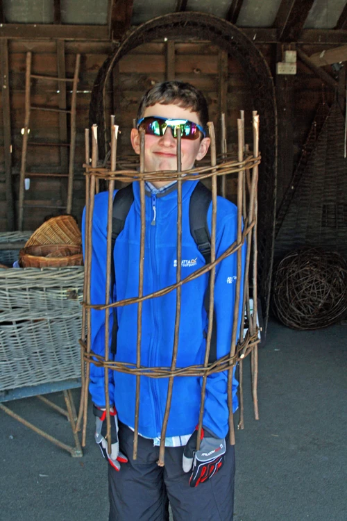 George trapped in a wicker… something.