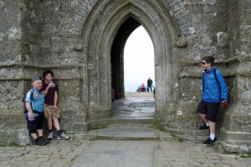 John, Lawrence and George atop Glastonbury Tor.