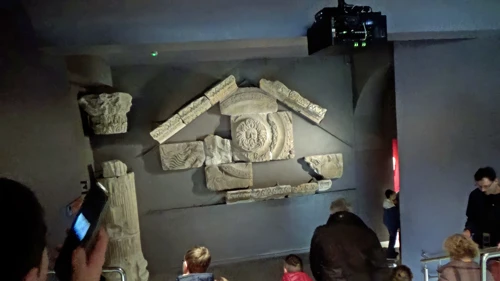 Temple Pediment, originally 15 m above the front courtyard of the Temple of Sulis Minerva. Looking down on visitors with powerful imagery