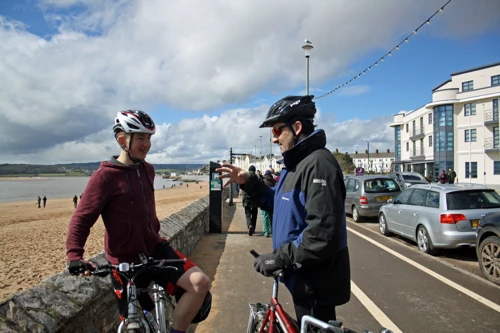 Tao chats with Will on Exmouth Beach.