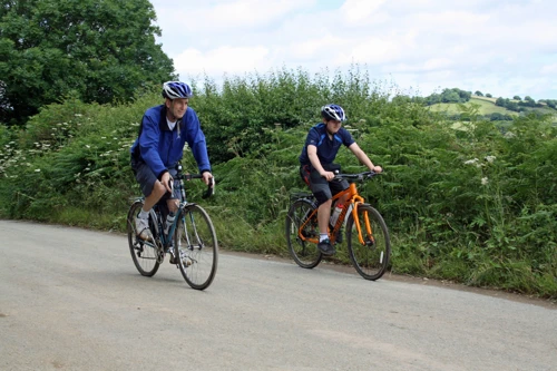Michael back on his bike at last, with Dillan near Tidwell, Landscove