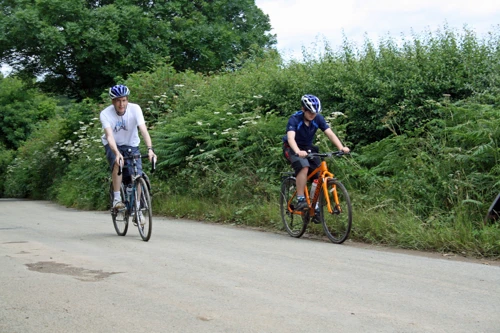 Michael back on his bike at last, with Dillan near Tidwell, Landscove