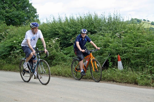 Michael back on his bike at last, with Dillan near Tidwell, Landscove