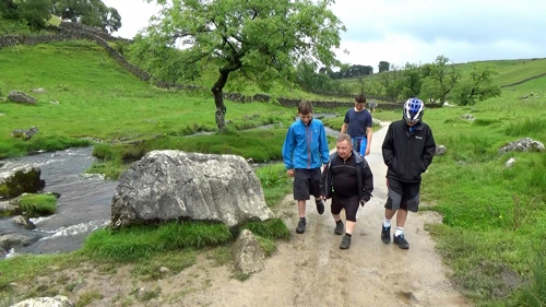 Approaching Malham Cove along the valley path.