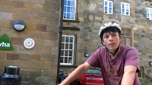 Lawrence at Whitby Youth Hostel entrance